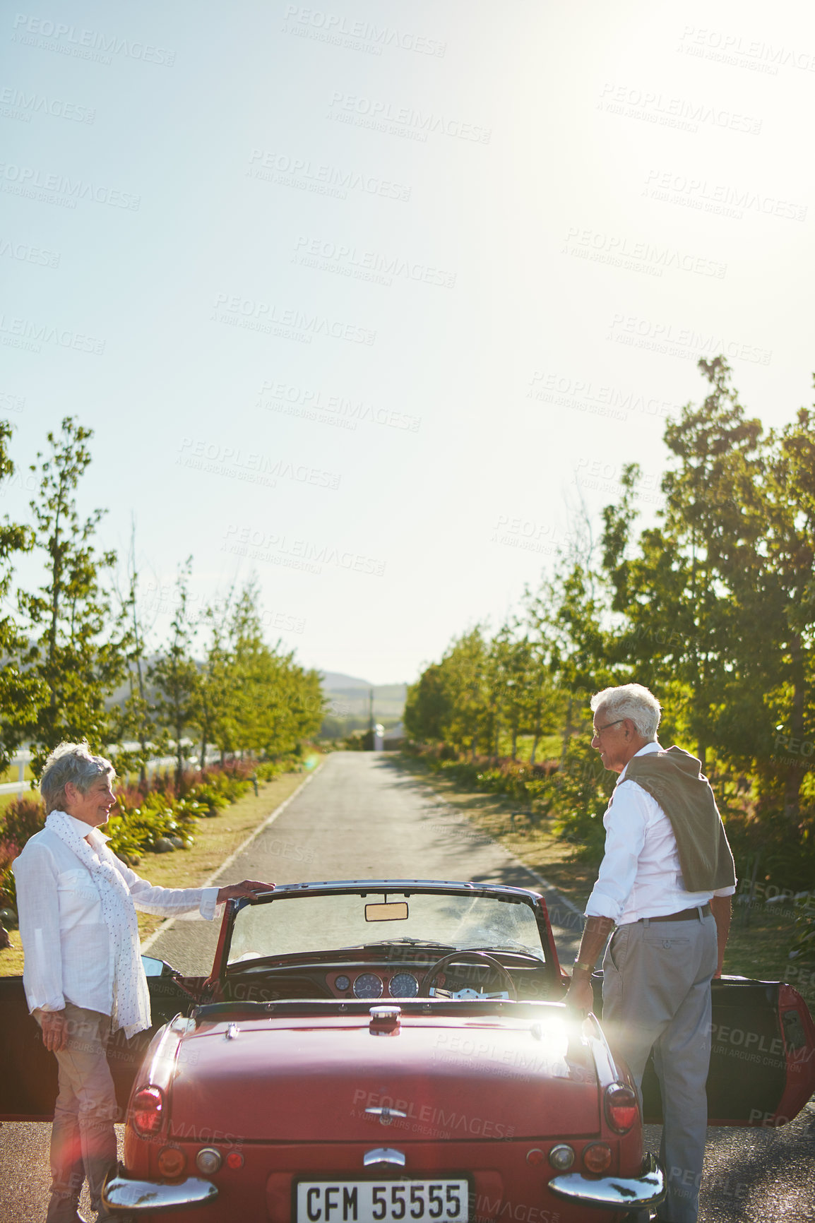 Buy stock photo Shot of a senior couple going on a road trip 