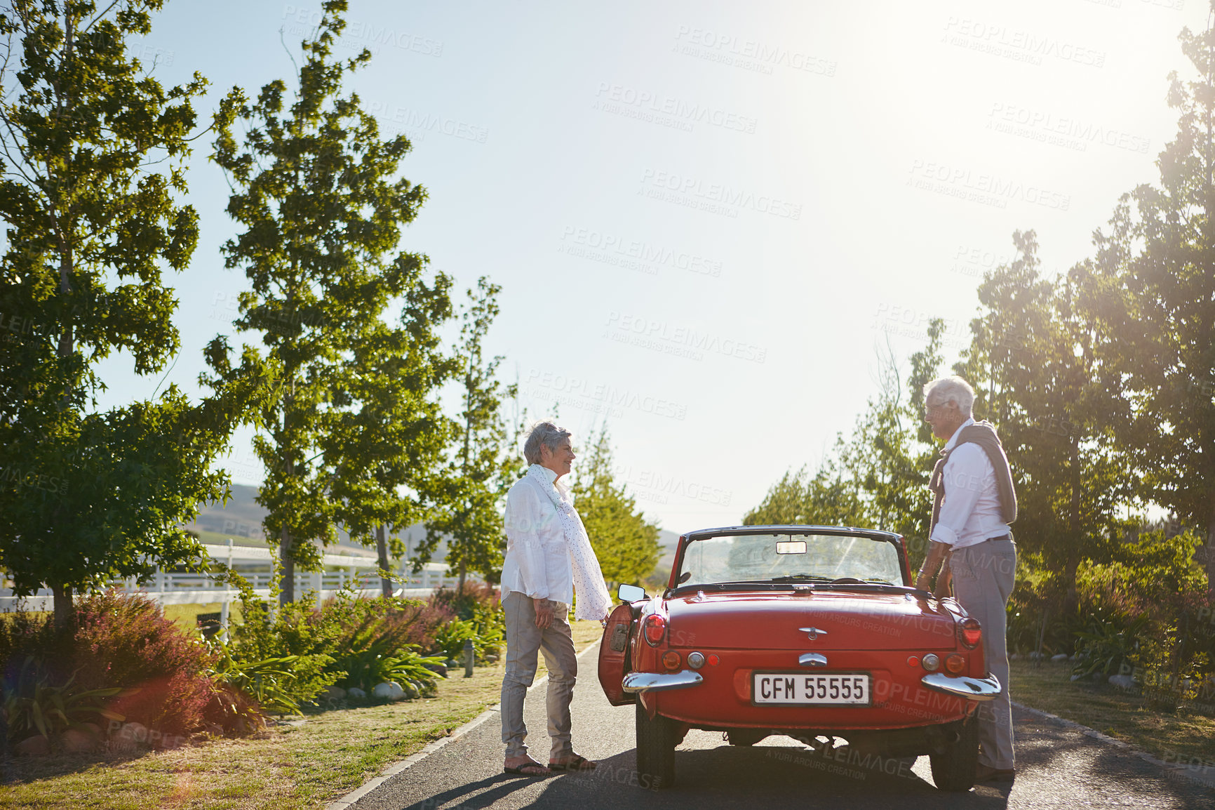 Buy stock photo Shot of a senior couple going on a road trip 