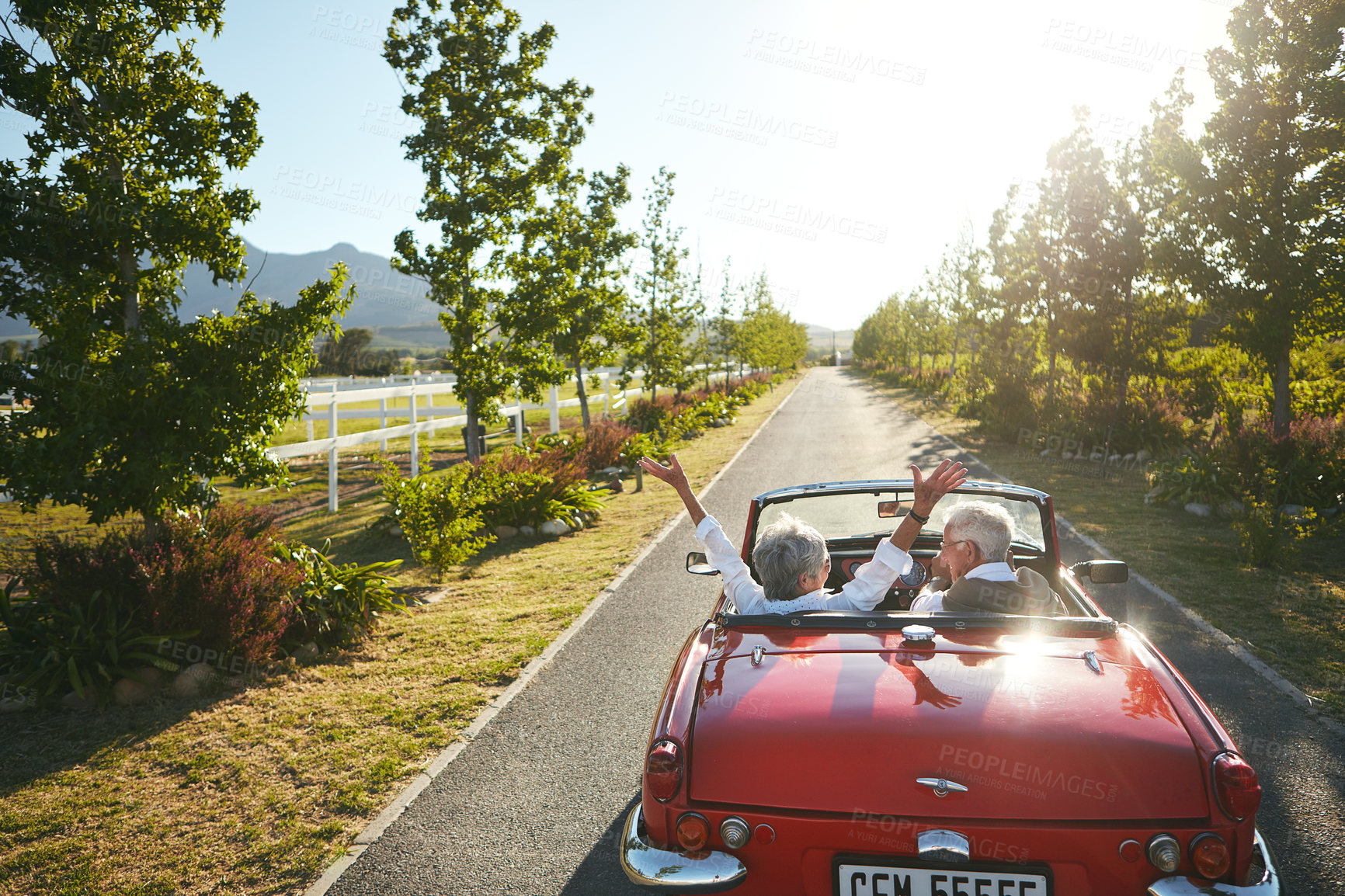 Buy stock photo Shot of a senior couple going on a road trip 