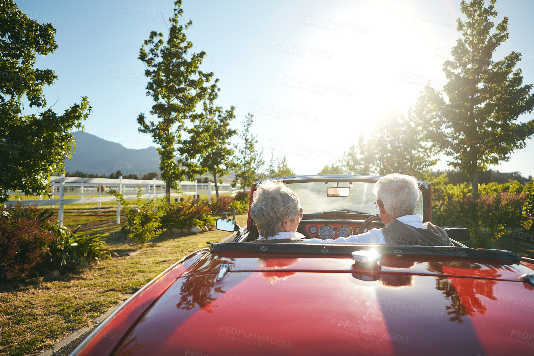 Buy stock photo Shot of a senior couple going on a road trip 