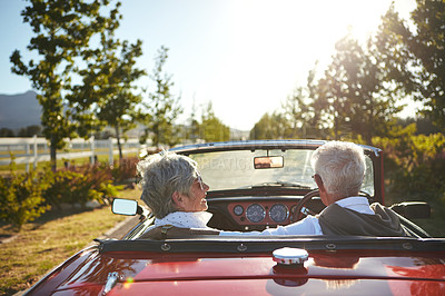 Buy stock photo Shot of a senior couple going on a road trip 