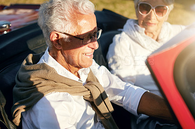 Buy stock photo Shot of a senior couple going on a road trip 