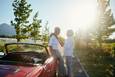 Buy stock photo Shot of a senior couple going on a road trip 