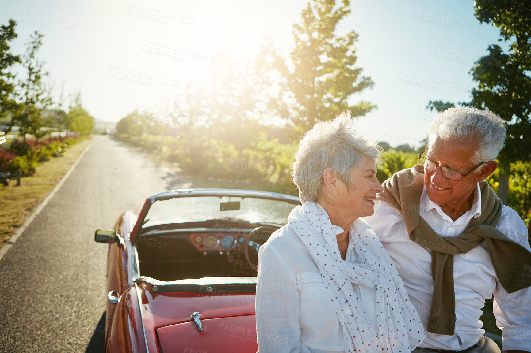 Buy stock photo Shot of a senior couple going on a road trip 