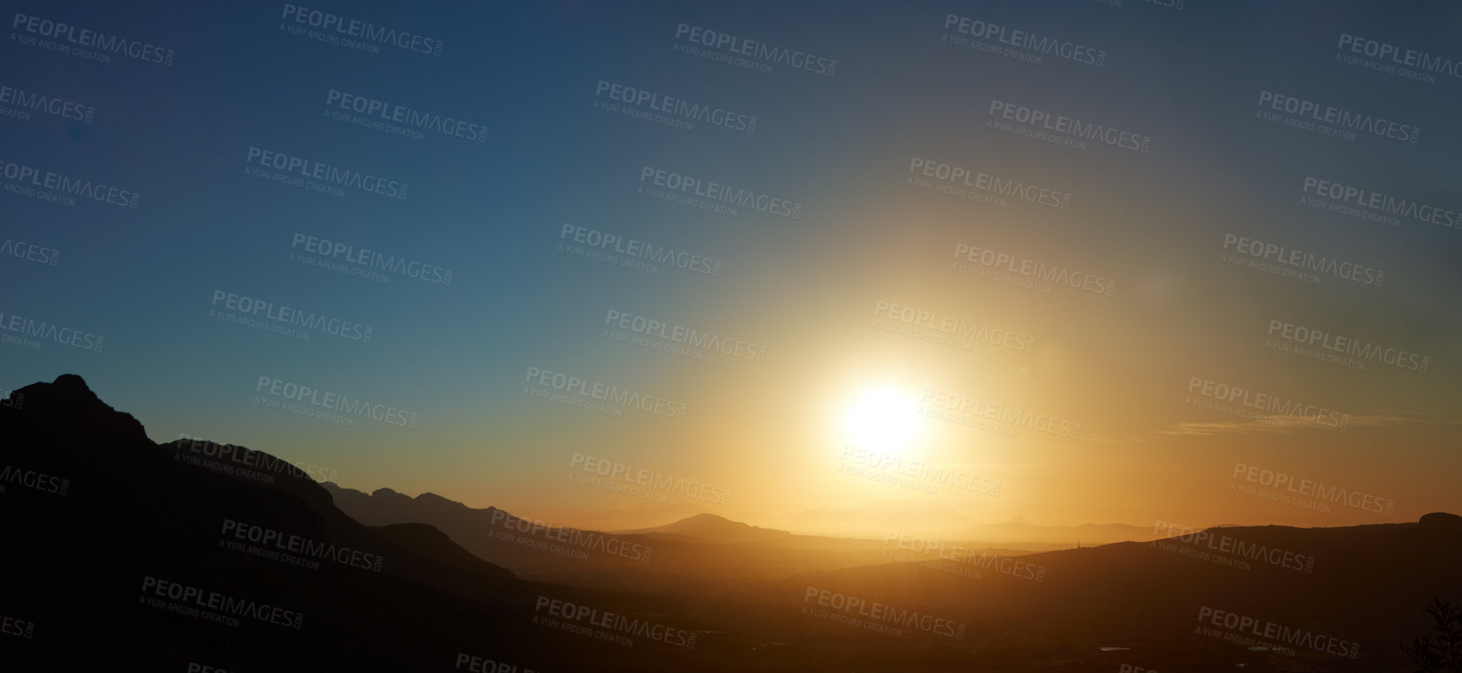 Buy stock photo Shot of the sun setting over the horizon