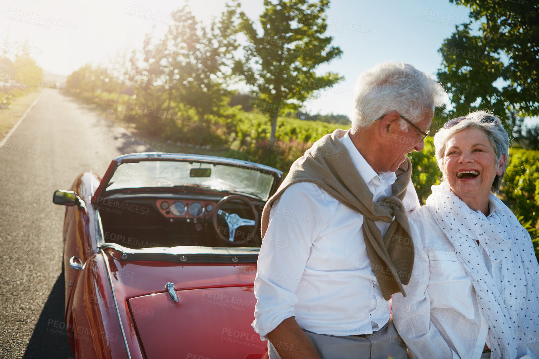 Buy stock photo Shot of a senior couple going on a road trip 