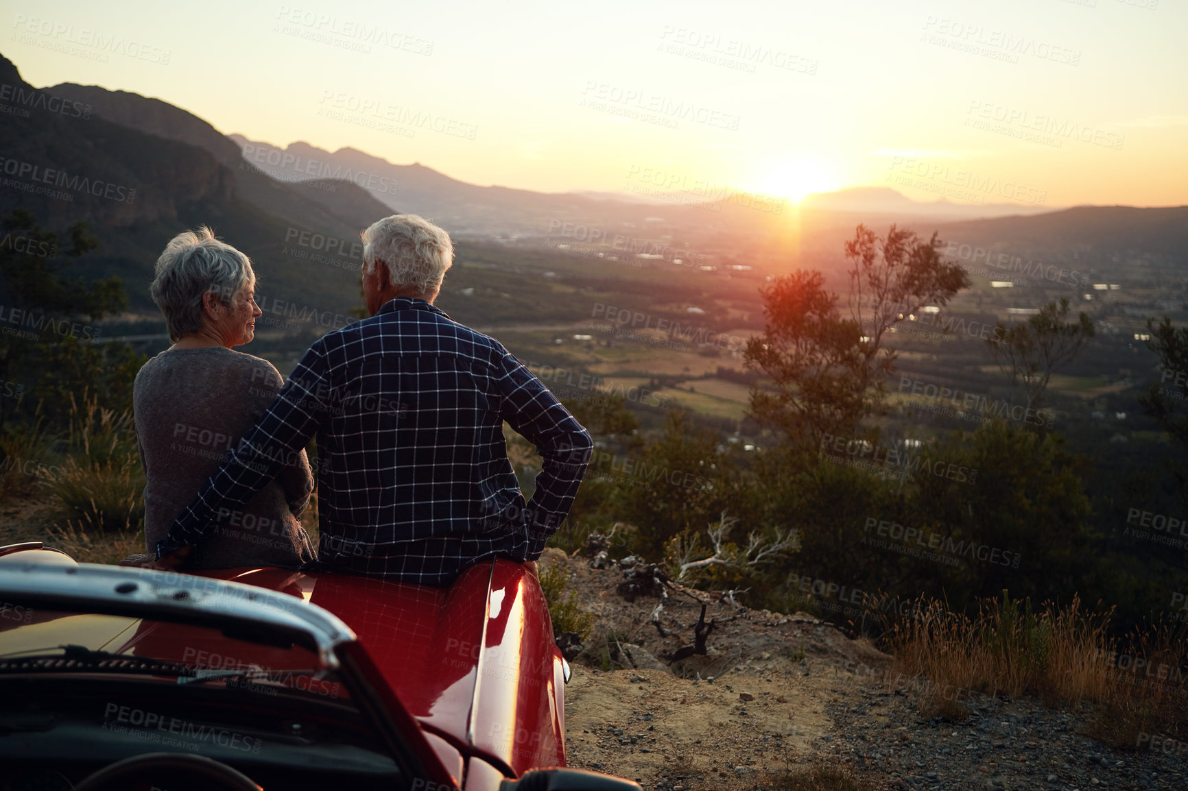 Buy stock photo Shot of a senior couple enjoying  a road trip