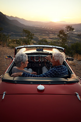 Buy stock photo Shot of a senior couple enjoying  a road trip