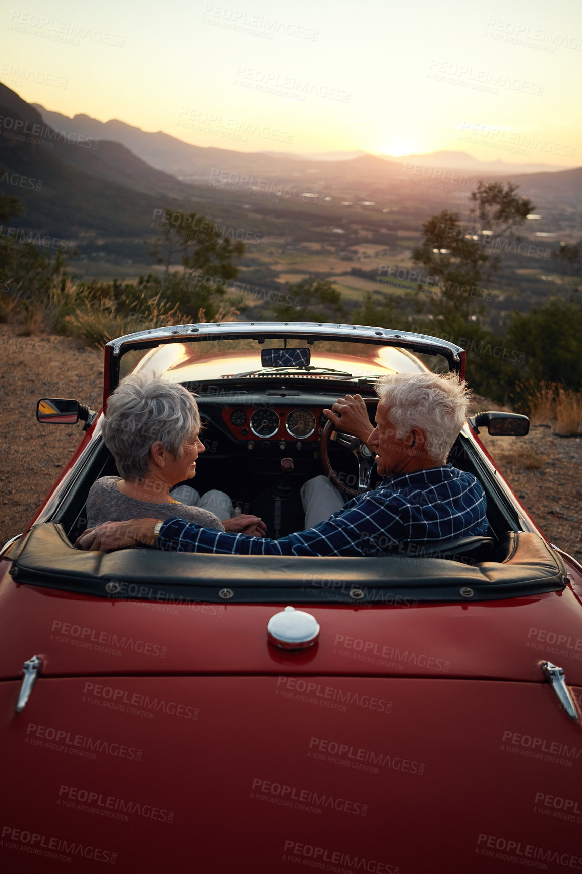 Buy stock photo Shot of a senior couple enjoying  a road trip