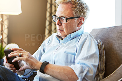 Buy stock photo House, phone or mature man on social media with internet connection or website notification on chair. Glasses, search or senior person texting on networking mobile app chat or reading news to relax