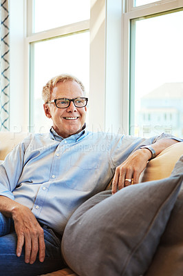 Buy stock photo Thinking, mature or happy man in living room to relax with ideas on sofa or couch at home for resting. Calm, glasses or senior male person with smile, peace or wellness in retirement, lounge or house