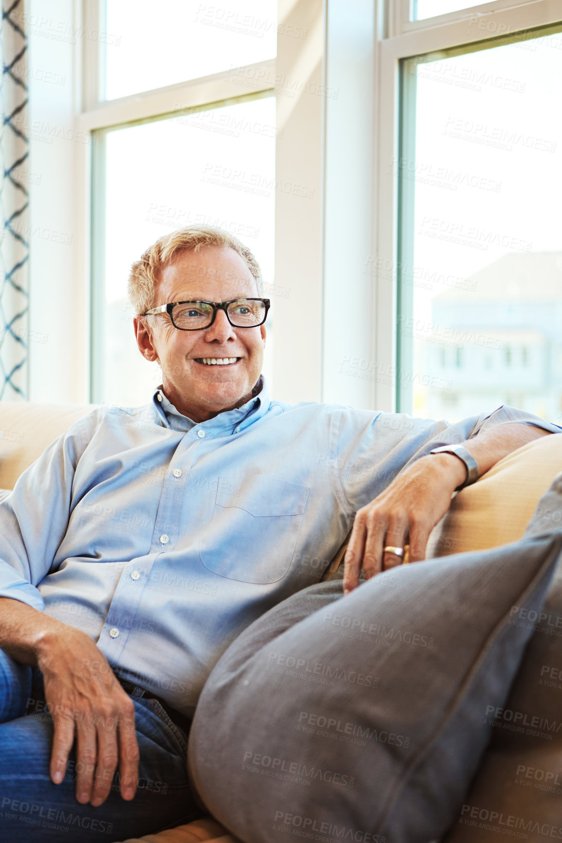 Buy stock photo Thinking, mature or happy man in living room to relax with ideas on sofa or couch at home for resting. Calm, glasses or senior male person with smile, peace or wellness in retirement, lounge or house