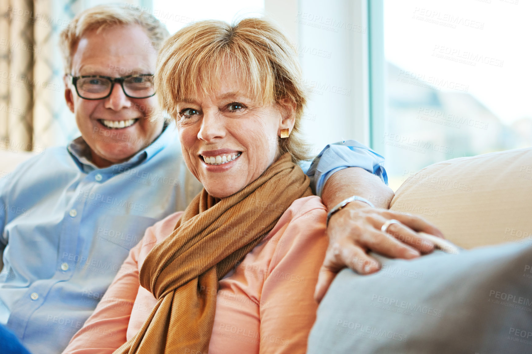 Buy stock photo Relax, smile and portrait of mature couple on sofa for bonding, healthy relationship and marriage. Retirement, home and senior man and woman on couch for love, commitment and happy in living room