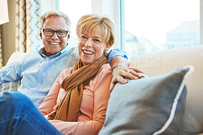 Buy stock photo Home, happy and portrait of mature couple on sofa for bonding, healthy relationship and marriage. Retirement, smile and senior man and woman on couch for love, commitment and hug in living room