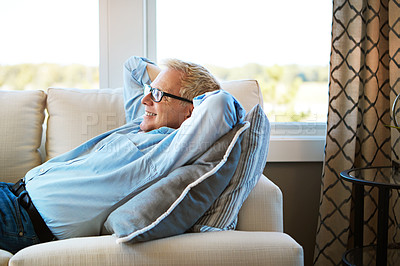 Buy stock photo Thinking, mature or happy man in house living room to relax with nostalgia or freedom on resting break. Glasses, remember or senior male person with smile or memory in retirement on sofa or couch