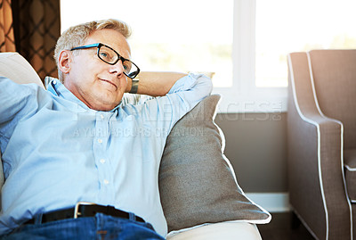 Buy stock photo Thinking, relax or happy mature man in house living room with nostalgia or freedom on resting break. Glasses, remember or senior male person with smile or memory in retirement on sofa or couch home