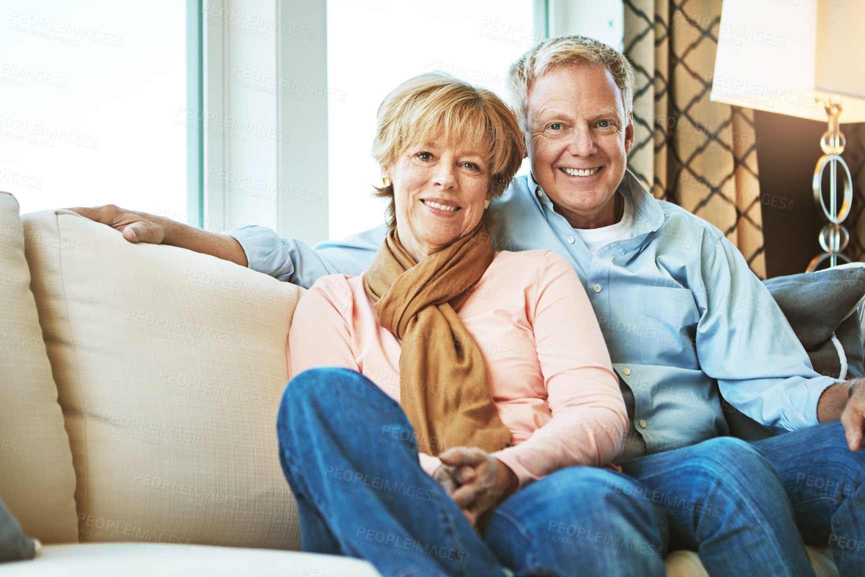 Buy stock photo Retirement, love and portrait of old couple on sofa for bonding, healthy relationship and marriage. Happy, home and senior man and woman on couch for embrace, commitment and happiness in living room