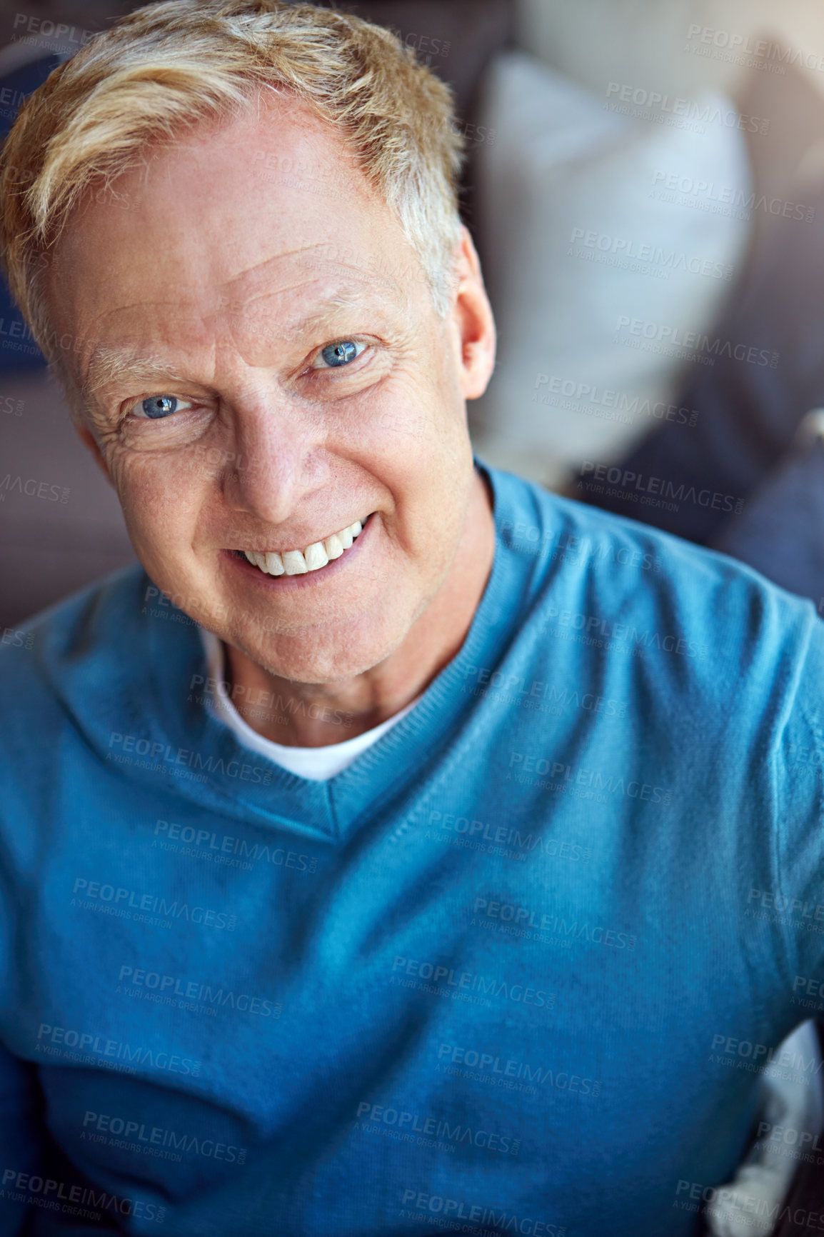 Buy stock photo Portrait, mature or happy man in home with confidence or joy on living room sofa in an apartment. Relax, face or senior person with smile, peace or wellness in home for a resting break in retirement