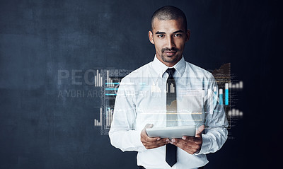 Buy stock photo Studio portrait of a young businessman connecting to a digital interface against a dark background