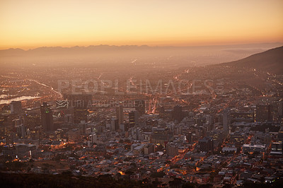 Buy stock photo Aerial view of a beautiful city at dawn