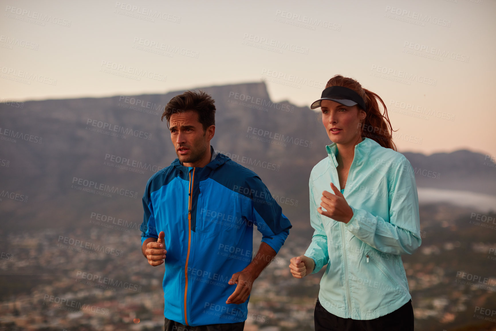 Buy stock photo Couple, running and morning exercise in outdoor, cityscape and cardio challenge or marathon training. People, action and bonding together on jog in nature, fitness and sports workout or practice