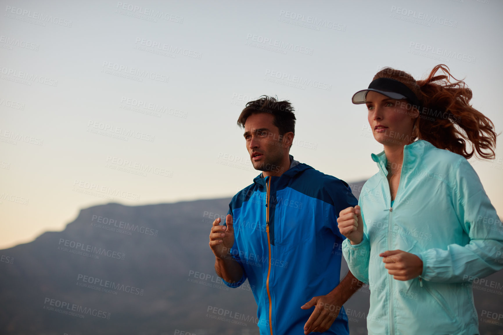 Buy stock photo Couple, running and sports exercise in outdoor, morning and cardio challenge or marathon training. People, action and bonding together on jog in nature, fitness and winter workout or practice