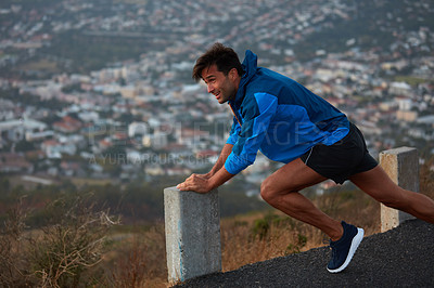 Buy stock photo Shot of a young athletes exercising outdoors