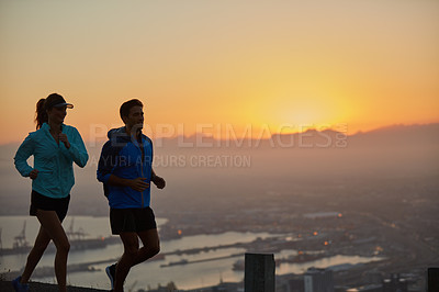 Buy stock photo Sunrise, couple and silhouette with mountain running for training, exercise and fitness with cardio. Wellness, sport and athlete with runner partner in nature together at morning with mockup space