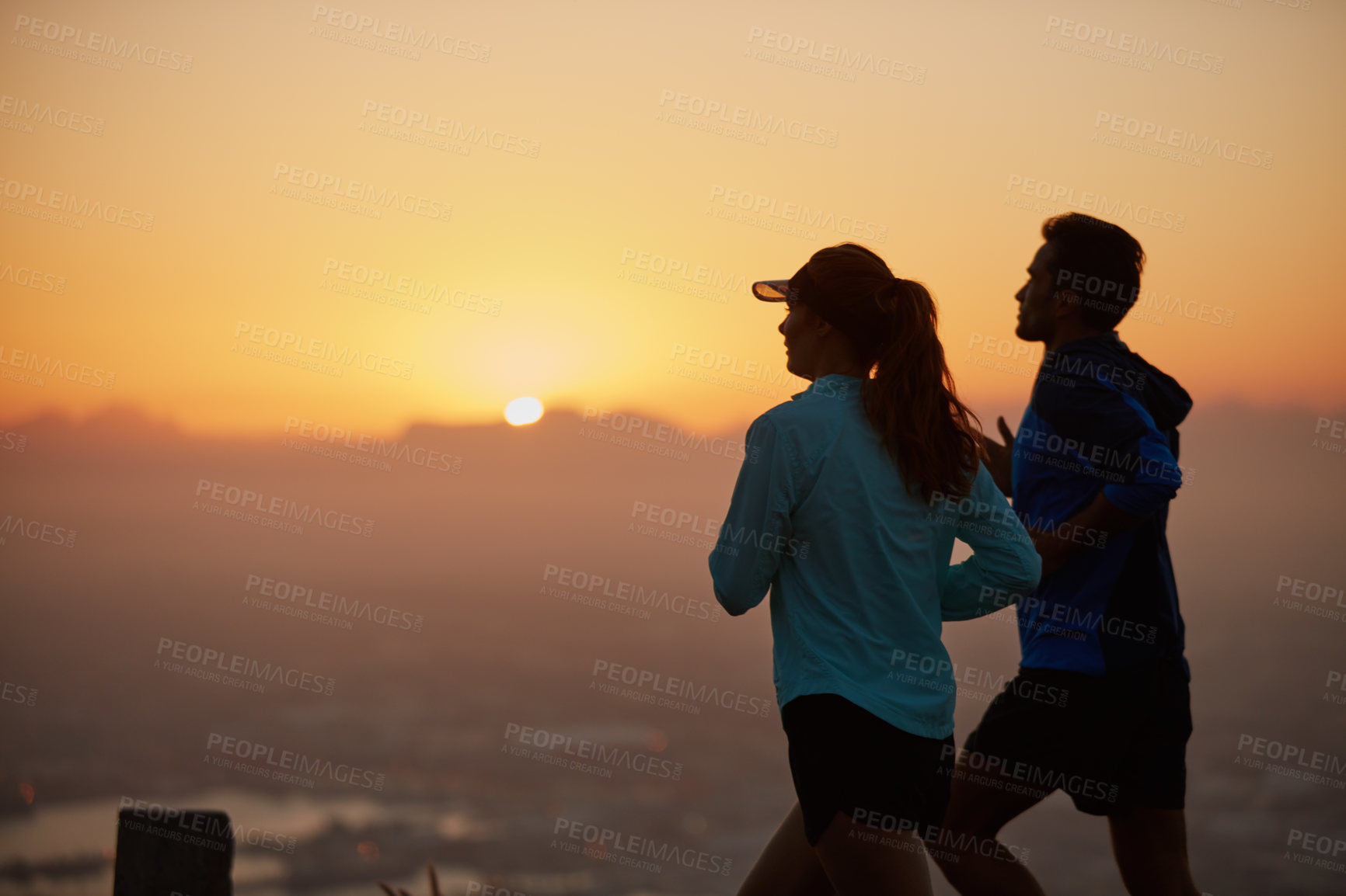 Buy stock photo Sunrise, couple and running silhouette for training, exercise and fitness with race cardio and view. Wellness, sport and athlete with runner partner in nature together in the morning with sprint