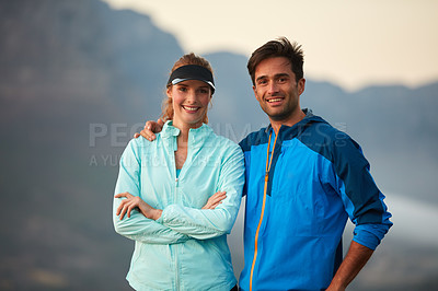 Buy stock photo Portrait of an athletic young couple out for a run in the morning