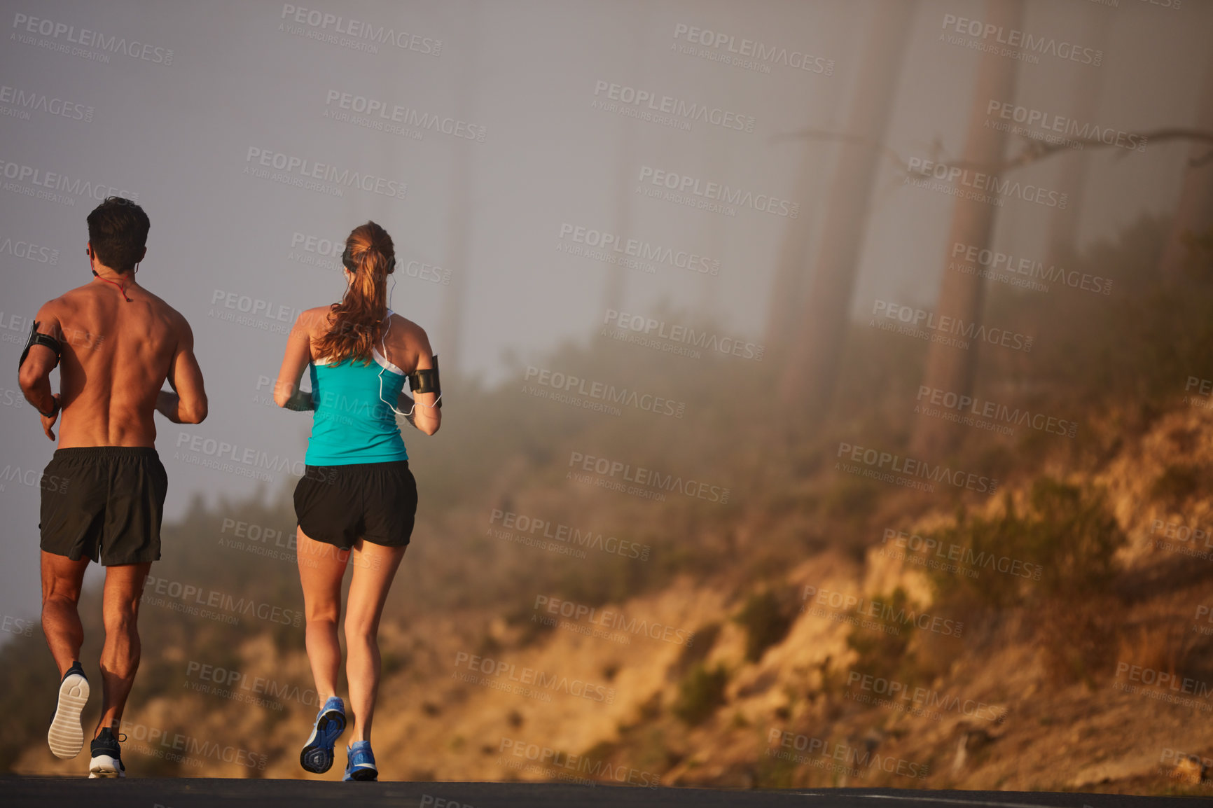 Buy stock photo Couple, running and fitness in outdoor street, coaching and cardio challenge or marathon training. People, action and bonding together on jog on mountain road, back and sports workout or practice