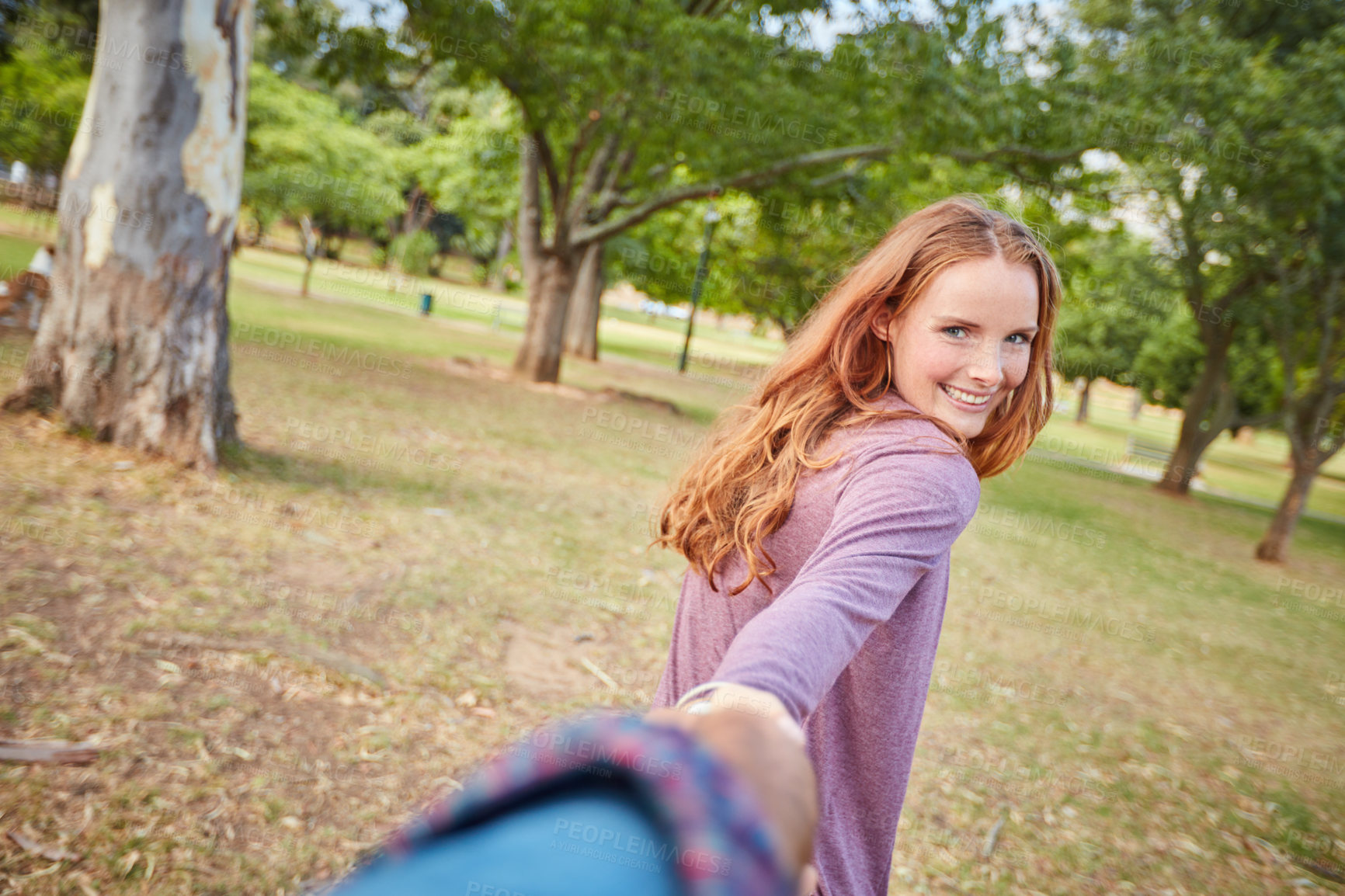 Buy stock photo POV, holding hands and happy couple with woman portrait and smile in park with love on holiday. Walking, care and student in nature and together on vacation outdoor with travel and date with support