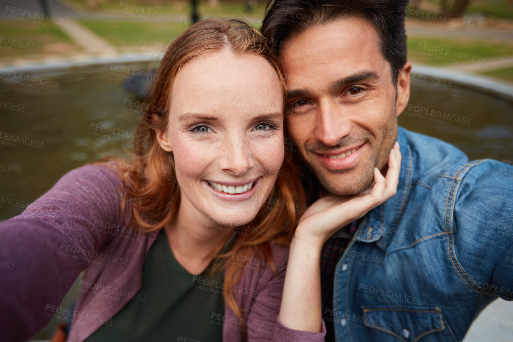 Buy stock photo Selfie, happy couple and hug in nature with love, fun and bonding on travel, date or anniversary outdoor. Support, portrait and people embrace in park with trust, care and commitment in Canada