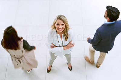 Buy stock photo Portrait of a businesswoman standing in a busy office