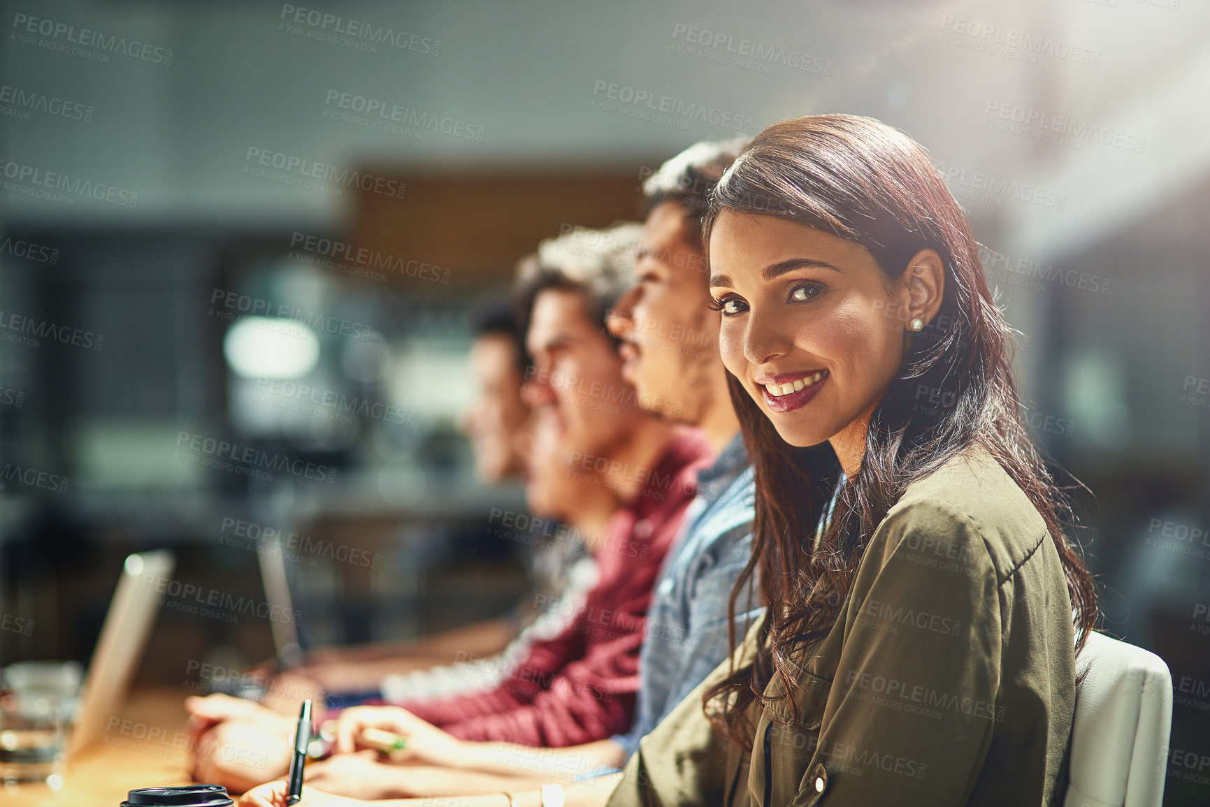 Buy stock photo Face, smile and portrait of business woman at desk in office for creative startup company. Teamwork, happy manager and technology for graphic designer, entrepreneur or worker coworking in meeting