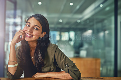 Buy stock photo Portrait of a confident young designer sitting in an office