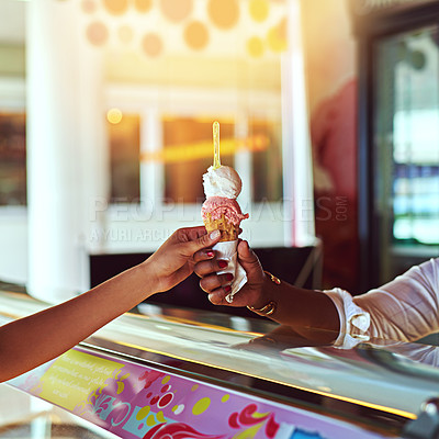 Buy stock photo Shot of a young woman enjoying an ice cream