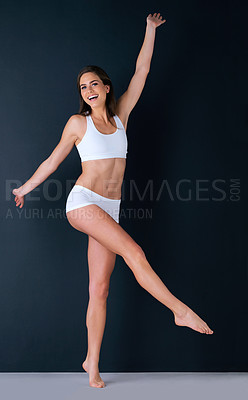 Buy stock photo Happy woman, portrait and body in underwear for weight loss, healthy diet or fitness against a studio background. Attractive female person or model smile in slim, lean figure or health and wellness