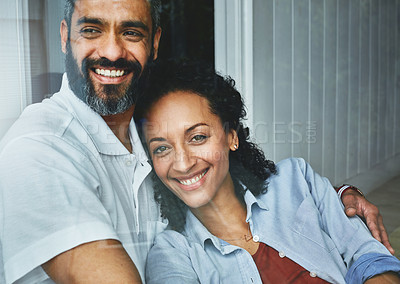 Buy stock photo Portrait of a relaxed couple enjoying the day at home together