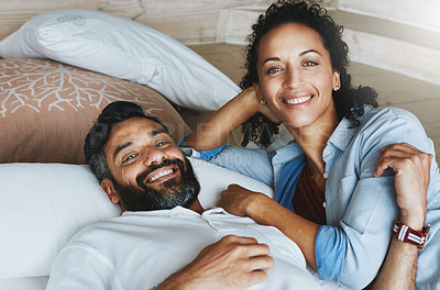 Buy stock photo Couple, relax and calm in home or bedroom, embrace and hug for love and marriage in bed. Weekend, cuddle and portrait of man and female person in house, pillow and break together for romance and rest