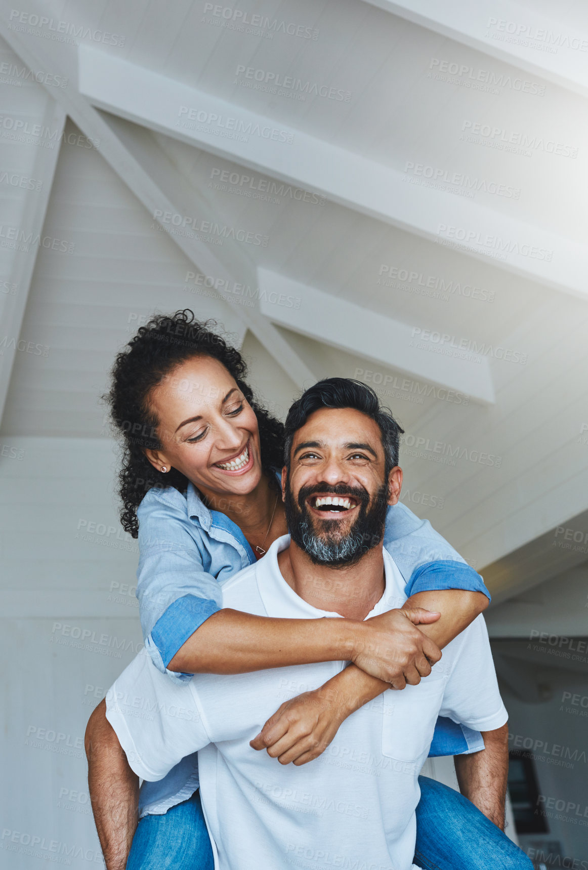 Buy stock photo Shot of a relaxed couple enjoying the day at home together