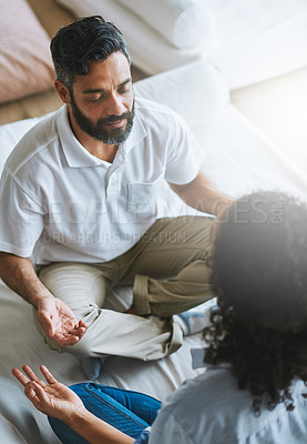 Buy stock photo Couple, relax and meditation in living room for spiritual wellness, fitness or zen workout together at home. Man and woman relaxing in relationship, meditate or yoga class on floor for peaceful mind