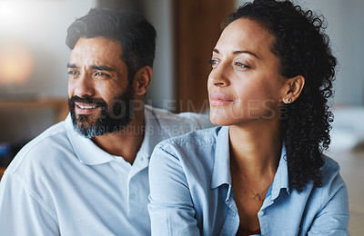 Buy stock photo Shot of a relaxed couple enjoying the day at home together