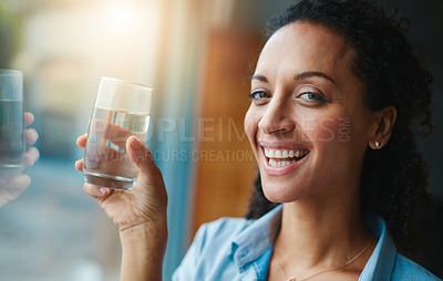 Buy stock photo Woman, portrait and happy in home with glass of water for wellness, wellbeing and hydration. Smile, female person and satisfied with self care for thirst, health and laugh in window and positive