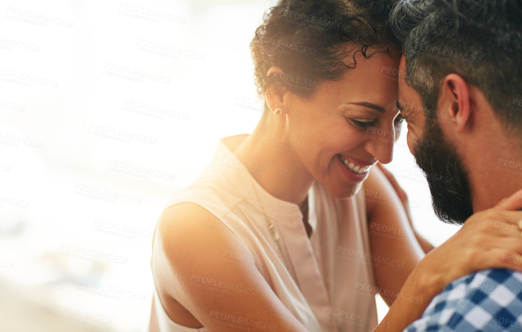 Buy stock photo Love, hug and face of couple with lens flare for commitment, embrace and trust outdoors. Marriage, mockup space and happy man and woman smile for romance on holiday, vacation and happiness together