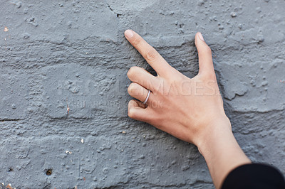 Buy stock photo Cropped shot of an engagement ring on an unrecognizable woman's hand