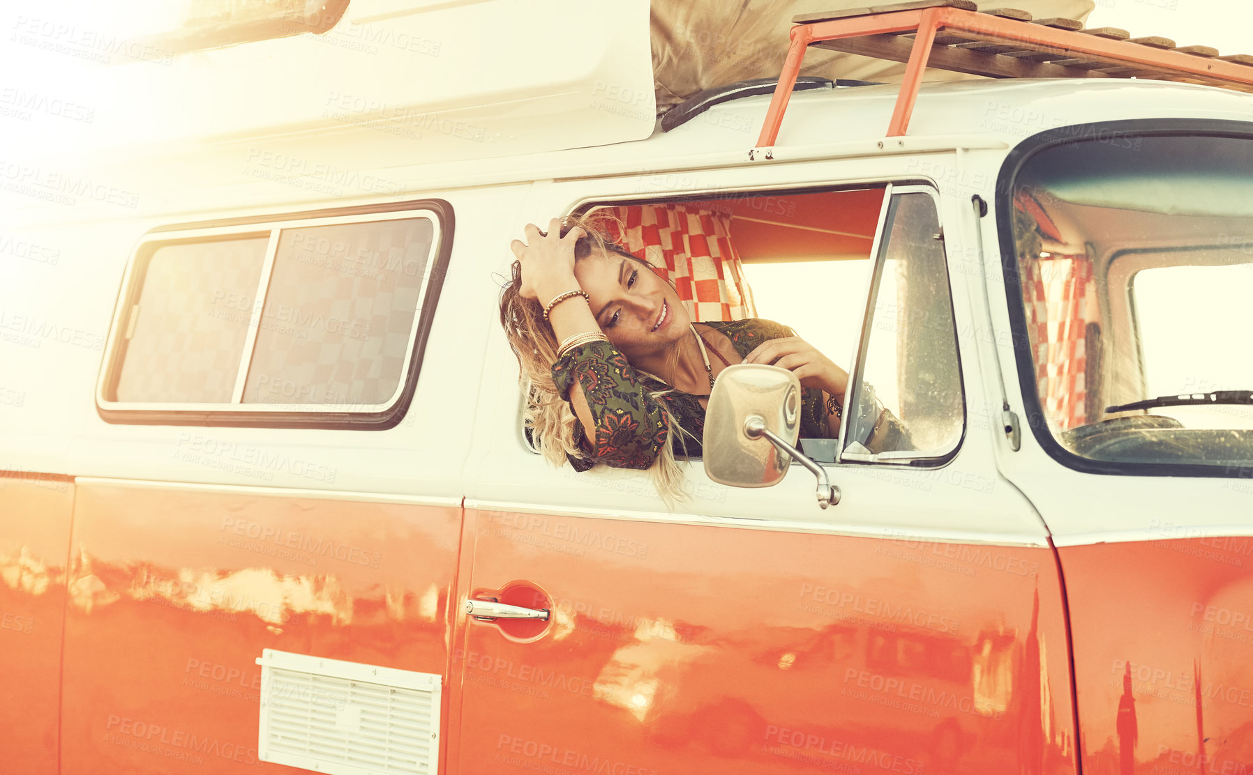 Buy stock photo Shot of a gorgeous young woman enjoying a roadtrip on her own