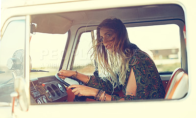 Buy stock photo Shot of a gorgeous young woman enjoying a roadtrip on her own
