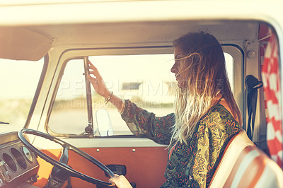 Buy stock photo Shot of a gorgeous young woman enjoying a roadtrip on her own