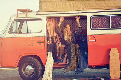 Buy stock photo Shot of a gorgeous young woman enjoying a roadtrip on her own